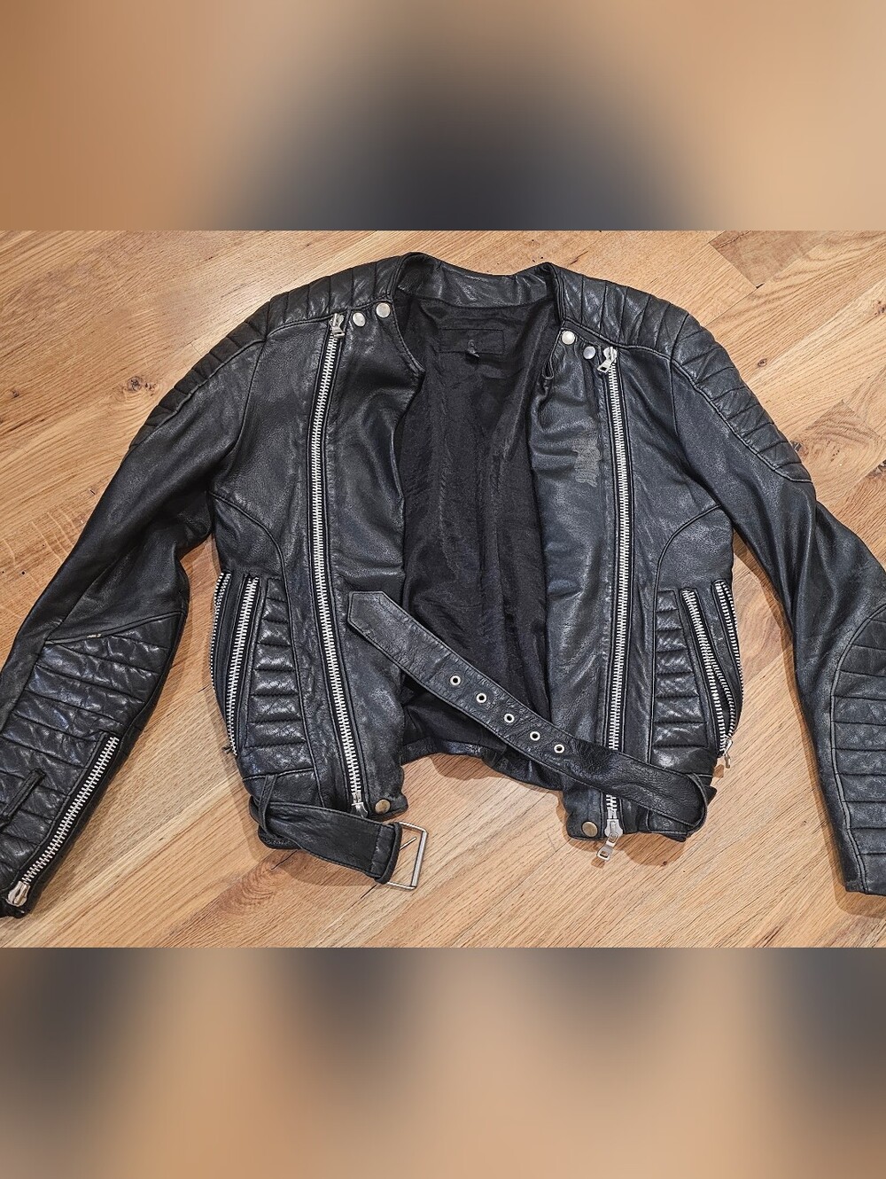 Genuine leather moto jacket — tag reads "Echtes Leder"